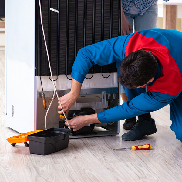 how much do you charge for refrigerator repair services in Almo